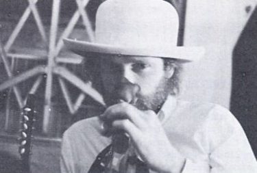 Mike Love Sniffs at a Rose