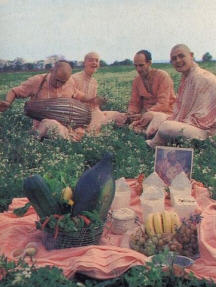 Devotees doing Kirtan