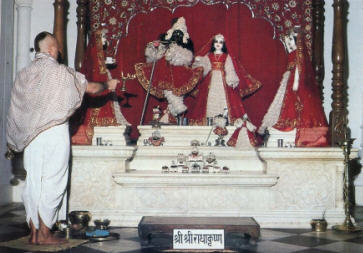 Worshipping The Deities of Radha and Krsna