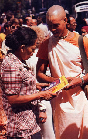 Devotees Distributing Books
