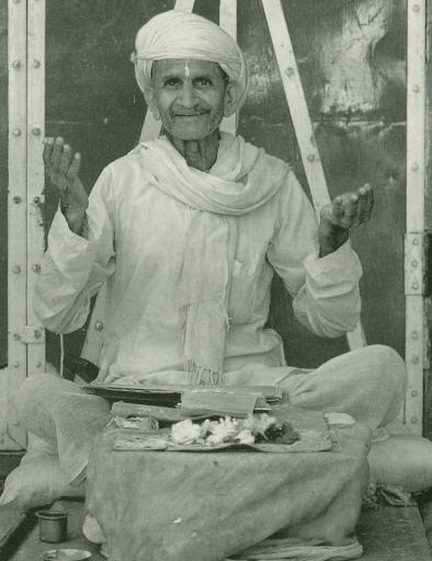 A Local Devotee Studying Scripture in the Temple