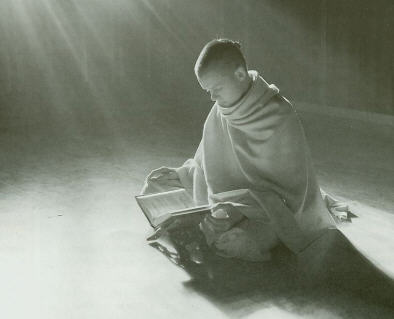 Devotee Reading The Srila Prabhupada Book