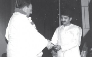 Radharaja Murari Dasa Receives Gift from Jayapataka Swami Maharaja