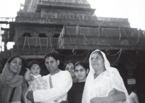 Champaklata Devi Dasi, Shyamsunder Dasa Holding a Baby