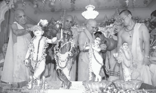 Gopal Krsna Goswami and Bhanu Swami Doing Abhiseka of The Deities