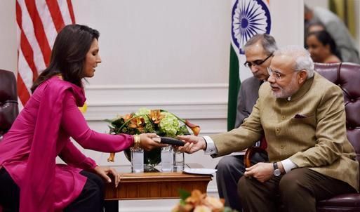 US Lawmaker Gifts Gita to Modi